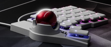 Close up of a trackball that is integrated into the Voyager.