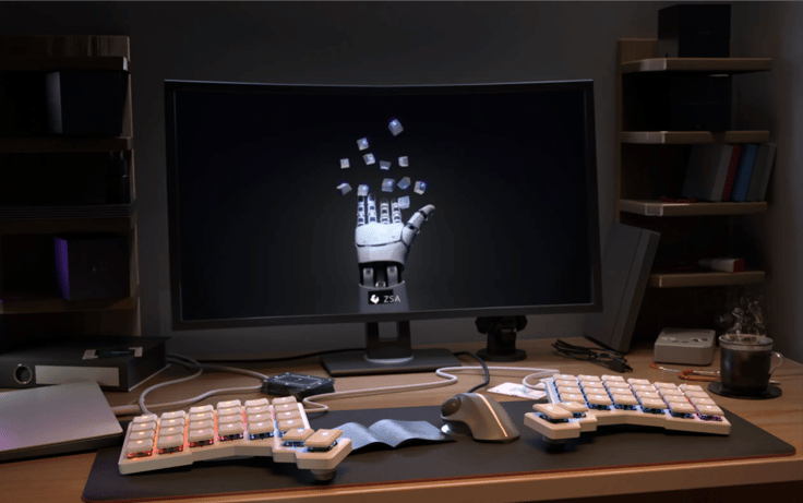 a Voyager keyboard on a desk setup